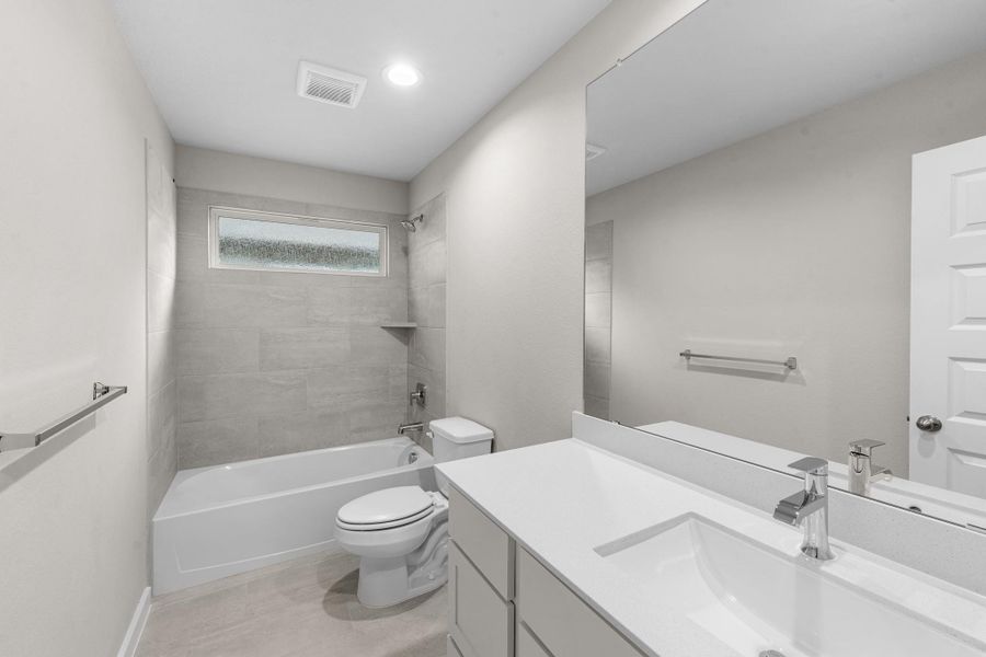 Furnished interior view inside a new home in Barton Creek Ranch, Conroe (Image 10).