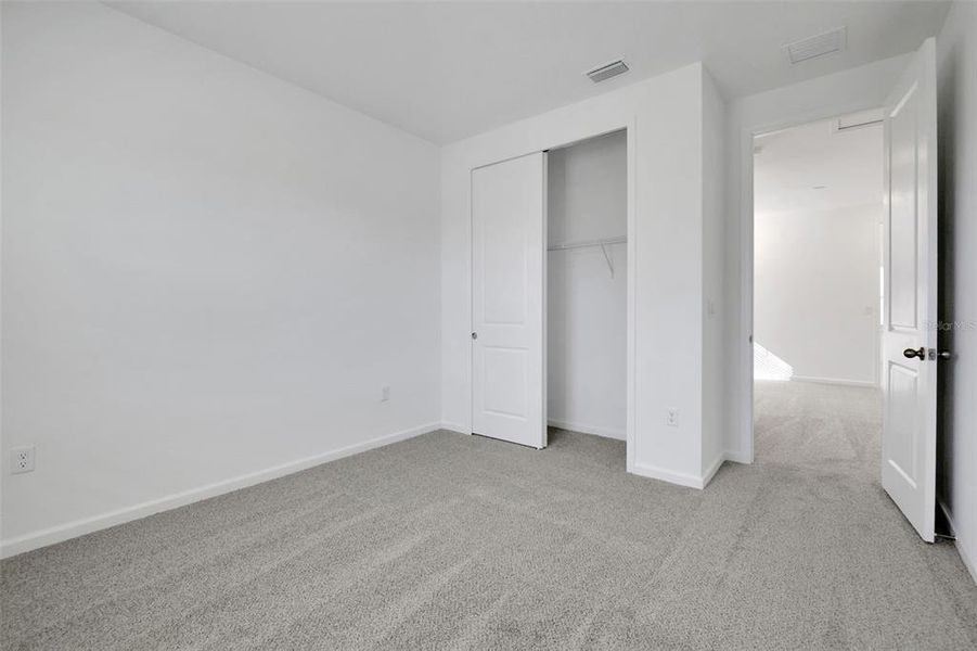 Spacious, unfurnished interior of a new home in Serenade at Ovation, Winter Garden (Image 35).