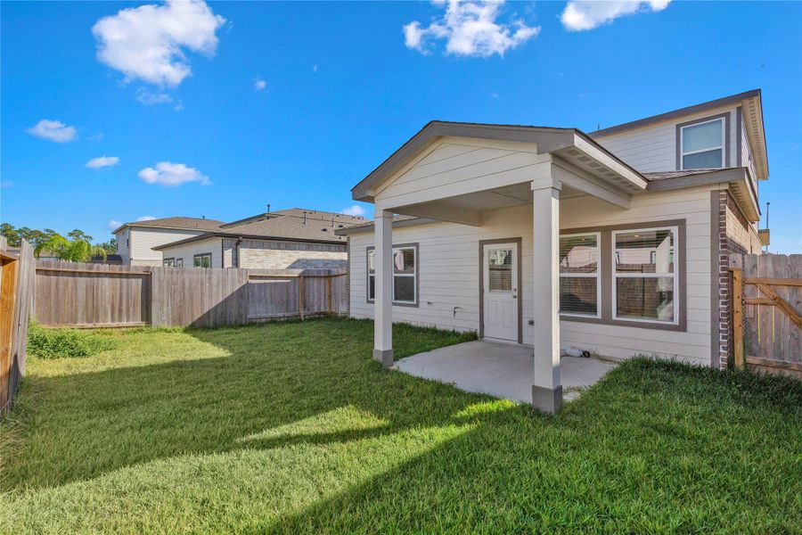 Exterior details and patio area of a home in , Magnolia (Image 4).