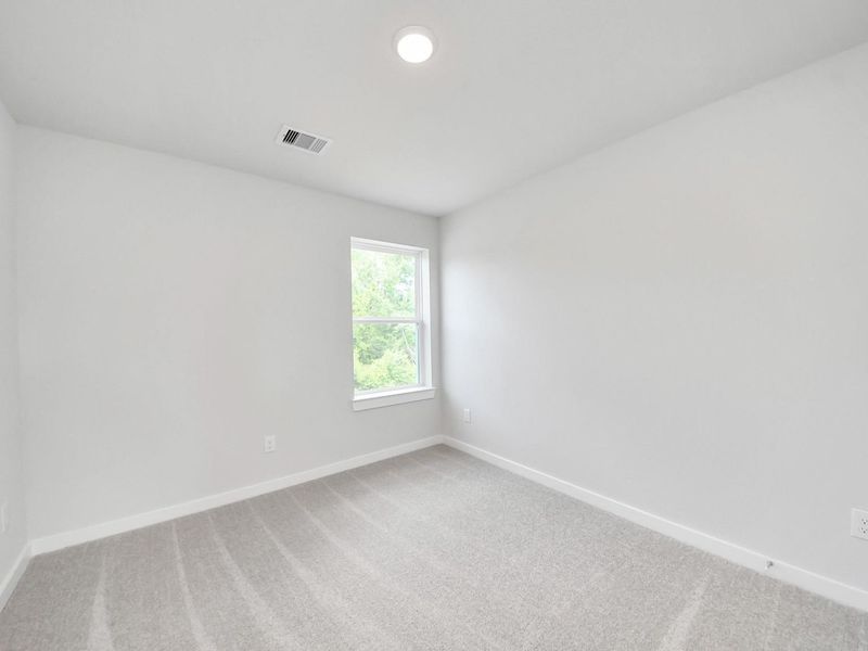 Spacious, unfurnished interior of a new home in Caney Creek Place, Conroe (Image 33).