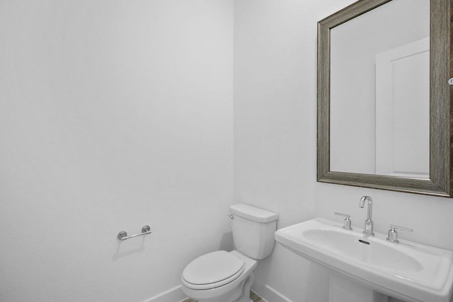 Furnished interior view inside a new home in Avalon at Friendswood 70s, Friendswood (Image 19).