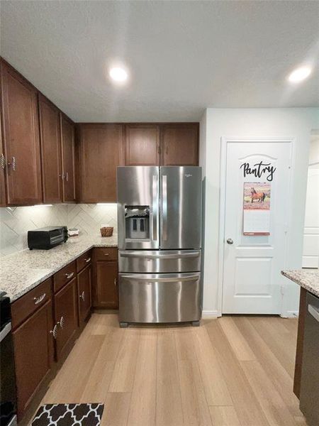 Kitchen is equipped with a butler pantry.