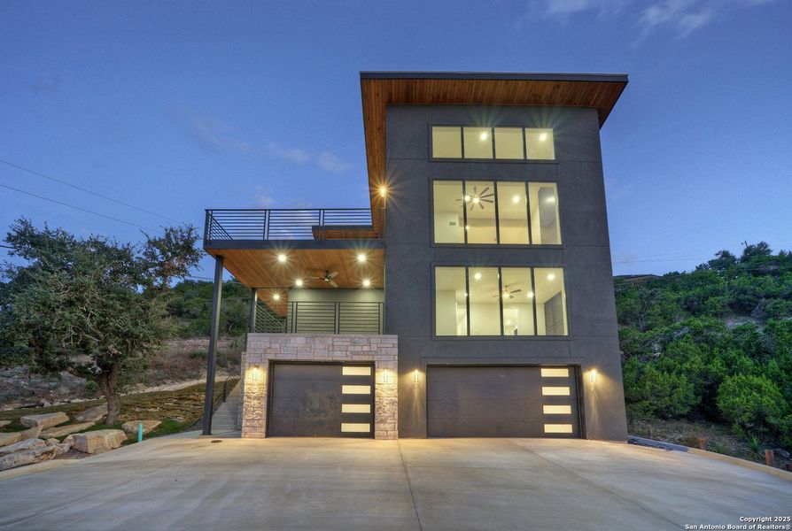 Front exterior of a new home in , Canyon Lake, TX, highlighting curb appeal (Image 26). Front exterior of a new home in , Canyon Lake, TX, highlighting curb appeal (Image 26).