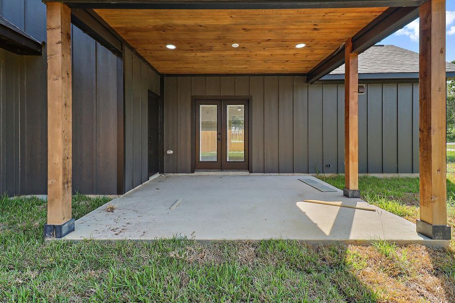 This back porch is sure to be the place for many many evenings!