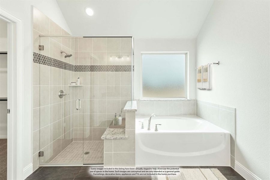 Master bathroom with glass-enclosed walk-in shower, soaking tub, and tile walls with mosaic accent border Master bathroom with glass-enclosed walk-in shower, soaking tub, and tile walls with mosaic accent border