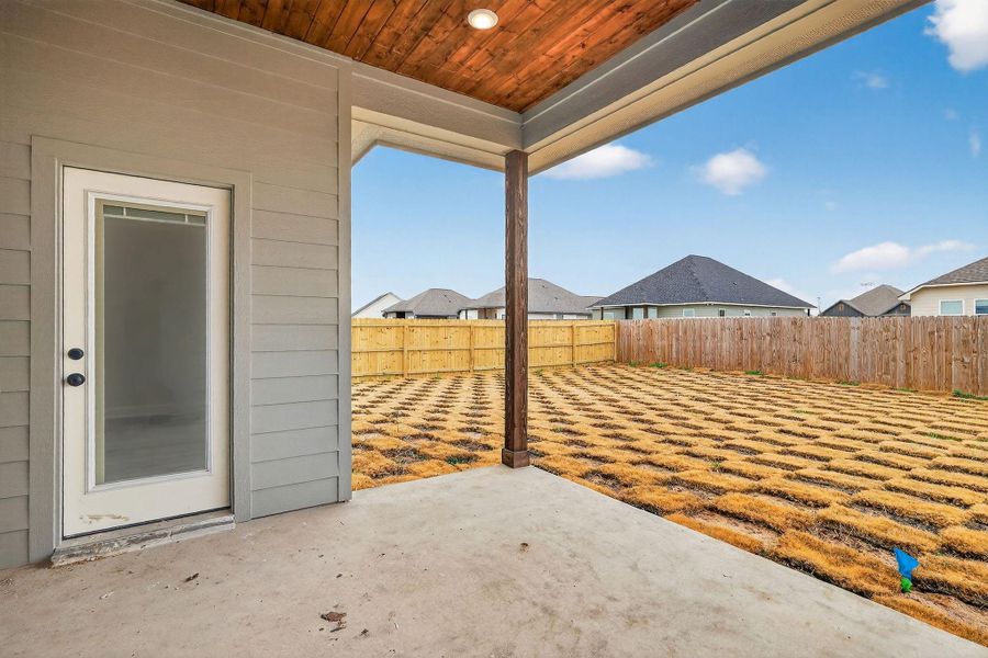Exterior details and patio area of a home in , Snook (Image 3).