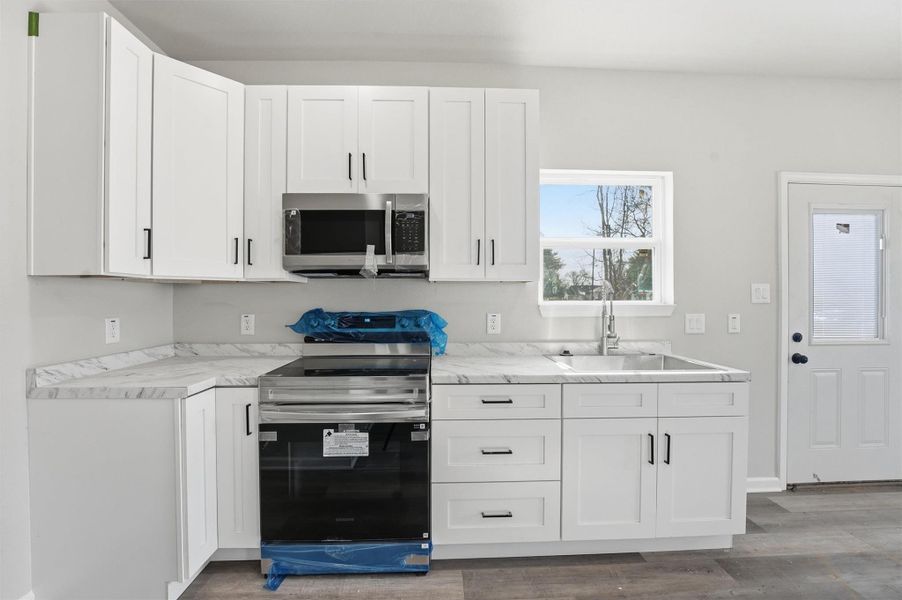 Furnished interior view inside a new home in , Beaumont (Image 5).