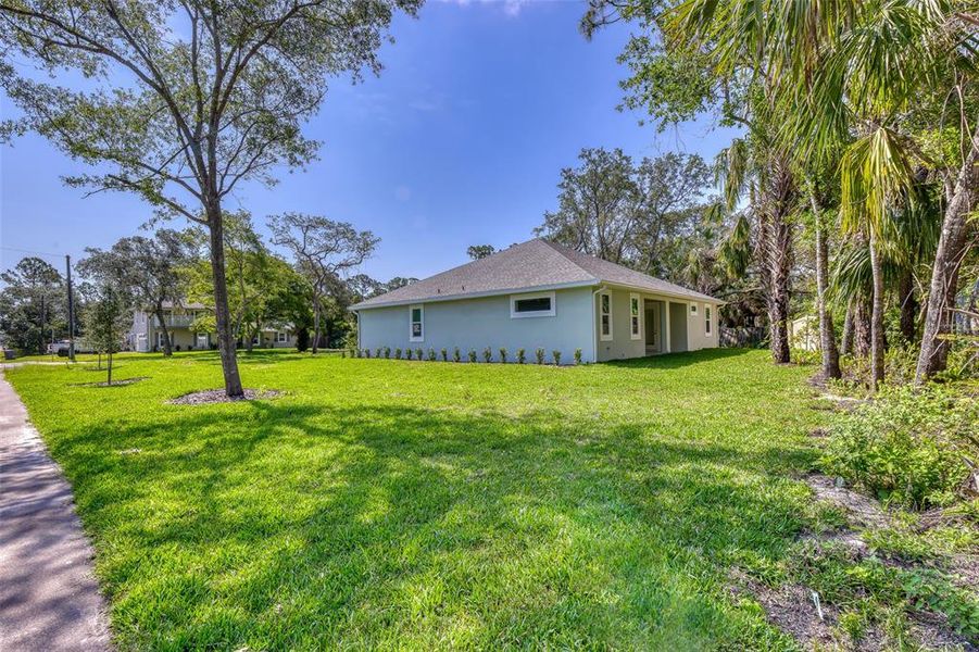 Exterior details and patio area of a home in , New Smyrna Beach (Image 32).