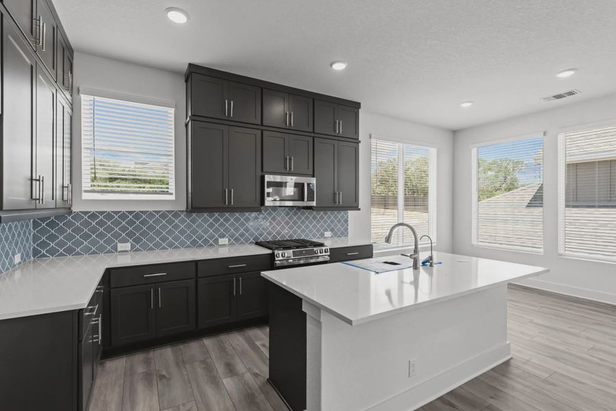 Representative furnished interior of a home built from the Athena by Chesmar Homes in Centero at Stone Oak, San Antonio (Image 5). Representative furnished interior of a home built from the Athena by Chesmar Homes in Centero at Stone Oak, San Antonio (Image 5).