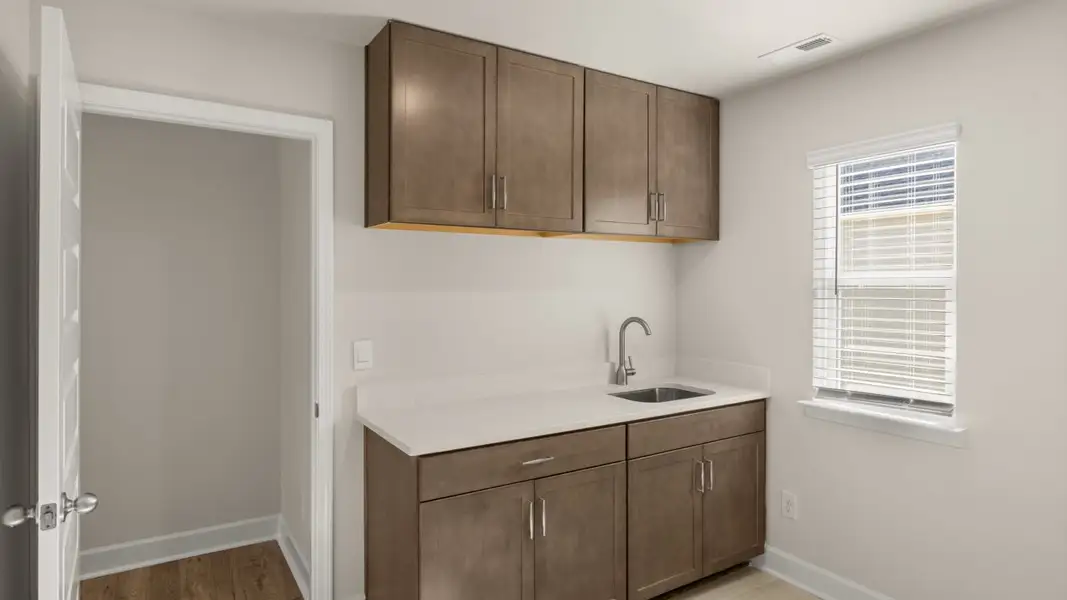 Representative furnished interior of a home built from the Hampshire by D.R. Horton in Heritage Pointe, Senoia (Image 19).