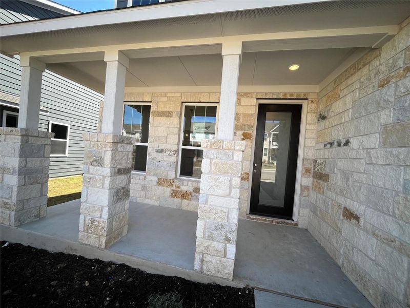 Exterior details and patio area of a home in Lariat, Liberty Hill (Image 21).