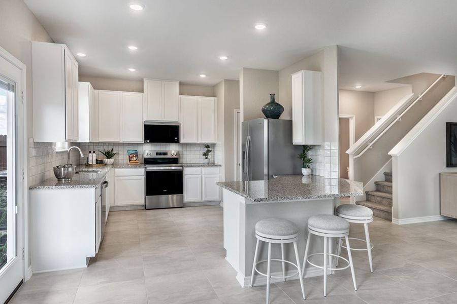 Representative furnished interior of a home built from the 1676 Modeled by KB Home in Nagel Crossing, San Antonio (Image 7).