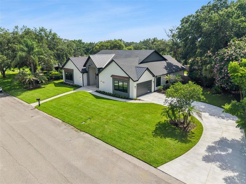 Front exterior of a new home in , Altamonte Springs, FL, highlighting curb appeal (Image 33). Front exterior of a new home in , Altamonte Springs, FL, highlighting curb appeal (Image 33).