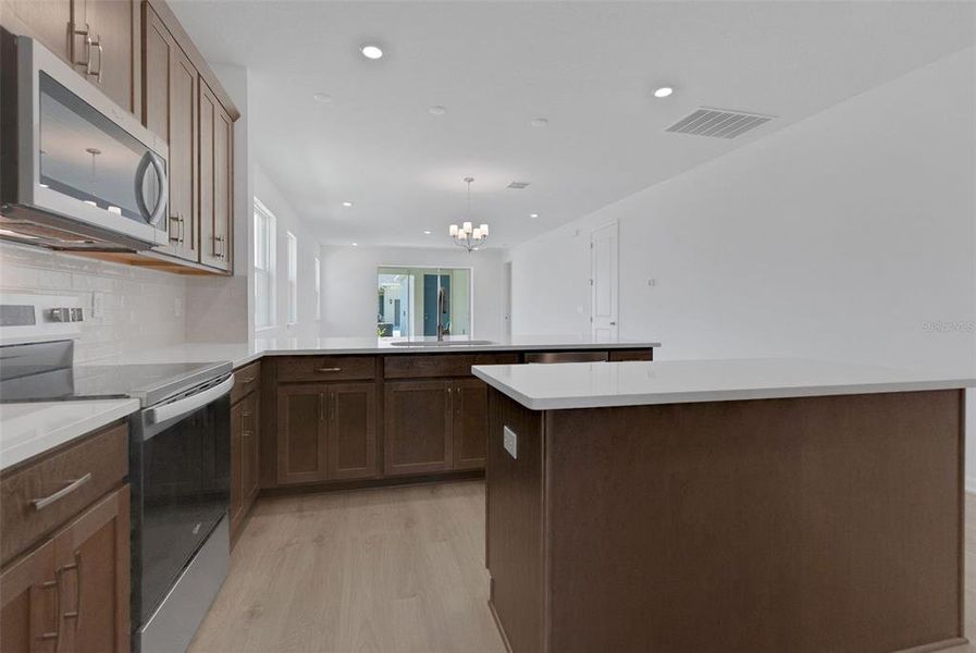 Furnished interior view inside a new home in Crossroads at Kelly Park, Apopka (Image 15).