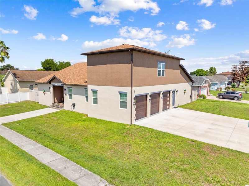Front exterior of a new home in , Kissimmee, FL, highlighting curb appeal (Image 2). Front exterior of a new home in , Kissimmee, FL, highlighting curb appeal (Image 2).