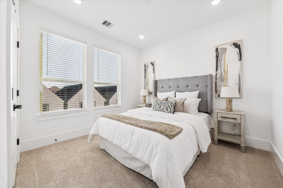 Furnished interior view inside a new home in Paul Quinn Heights, Houston (Image 21).