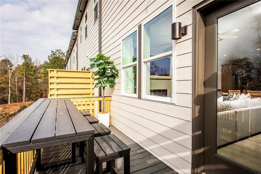 Exterior details and patio area of a home in Towne Village at Suwanee Dam, Sugar Hill (Image 27).