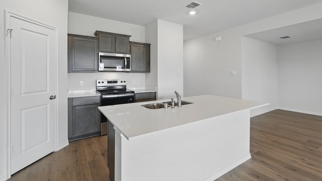 Furnished interior view inside a new home in Crane Crossing, Crandall (Image 3).