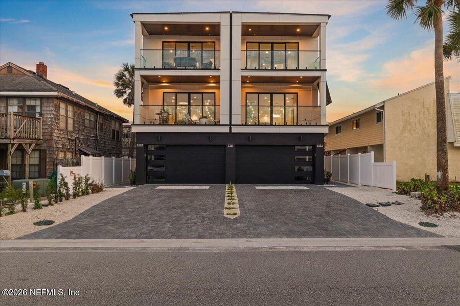 Front exterior of a new home in , Jacksonville Beach, FL, highlighting curb appeal (Image 37).