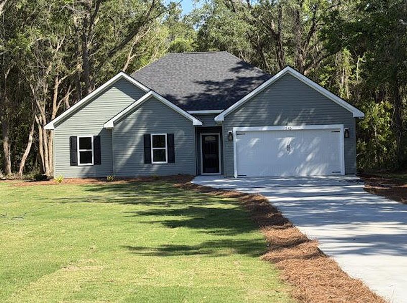 Front exterior of a new home in , McClellanville, SC, highlighting curb appeal (Image 15). Front exterior of a new home in , McClellanville, SC, highlighting curb appeal (Image 15).