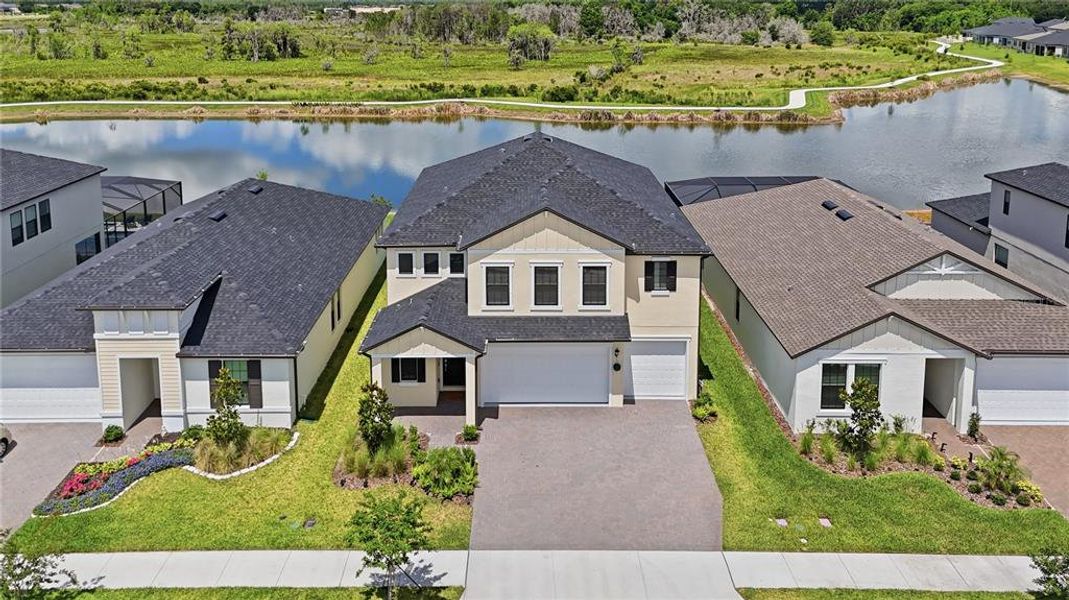 Front exterior of a new home in Connerton, Land O' Lakes, FL, highlighting curb appeal (Image 28).