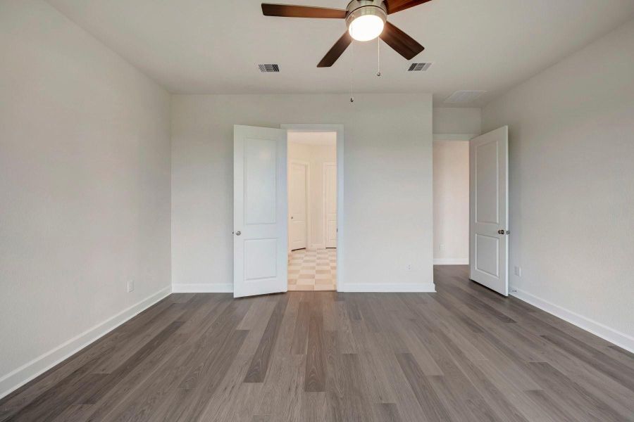 Spacious, unfurnished interior of a new home in Jordan Ranch - Premier Collection, Fulshear (Image 31).