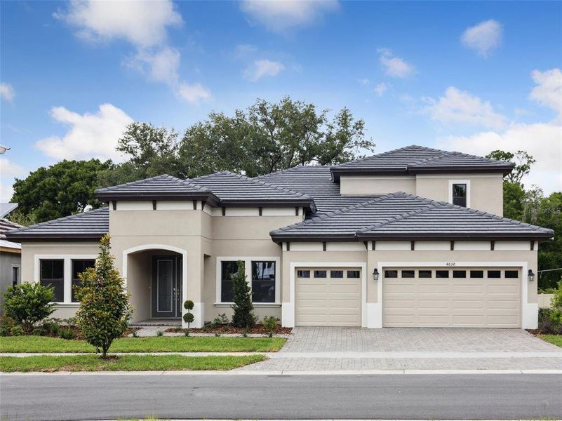 Front exterior of a new home in Crestwood Estates, Valrico, FL, highlighting curb appeal (Image 1). Front exterior of a new home in Crestwood Estates, Valrico, FL, highlighting curb appeal (Image 1).