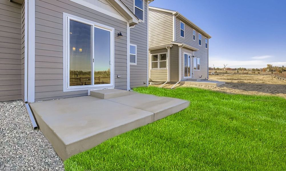 Exterior details and patio area of a home in Country Club Reserve – Fort Collins, Fort Collins (Image 3).