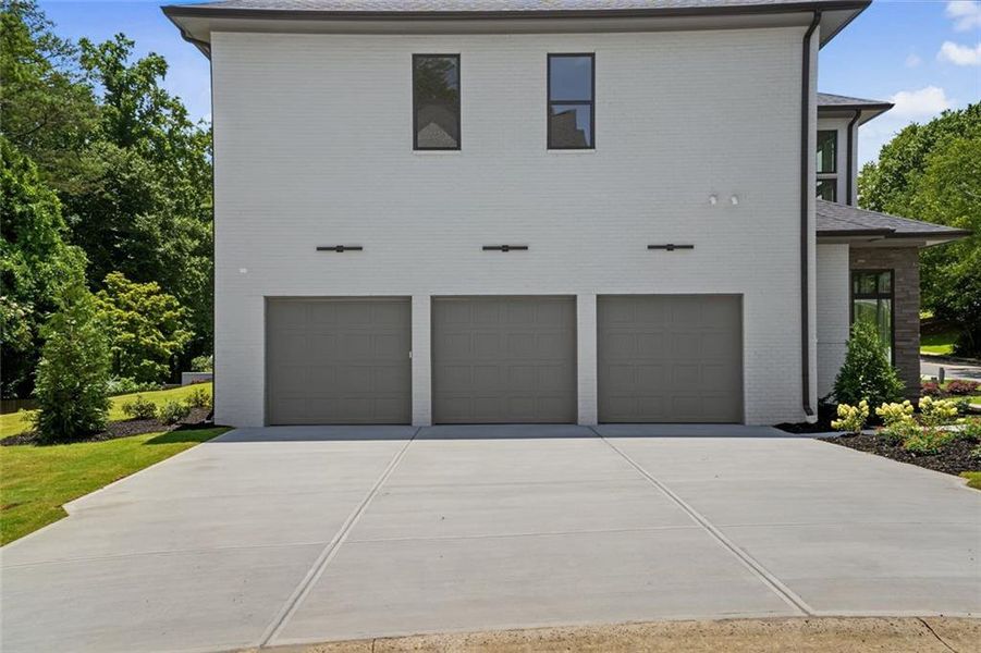 Front exterior of a new home in , Marietta, GA, highlighting curb appeal (Image 31). Front exterior of a new home in , Marietta, GA, highlighting curb appeal (Image 31).