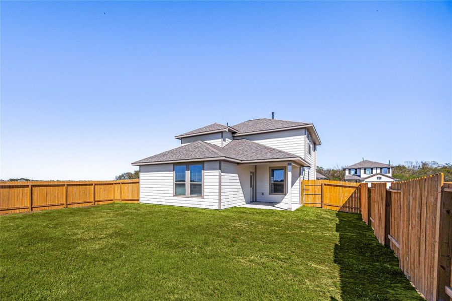 Enjoy a spacious backyard that offers plenty of room for outdoor activities, entertaining, or simply relaxing in a private setting. Enjoy a spacious backyard that offers plenty of room for outdoor activities, entertaining, or simply relaxing in a private setting.