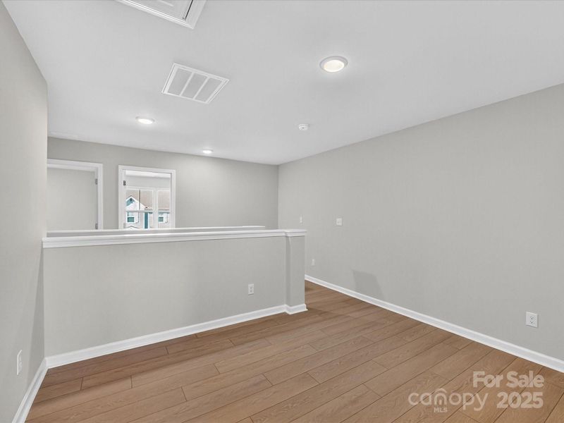 Spacious, unfurnished interior of a new home in North Creek Village - Townhomes, Huntersville (Image 26).