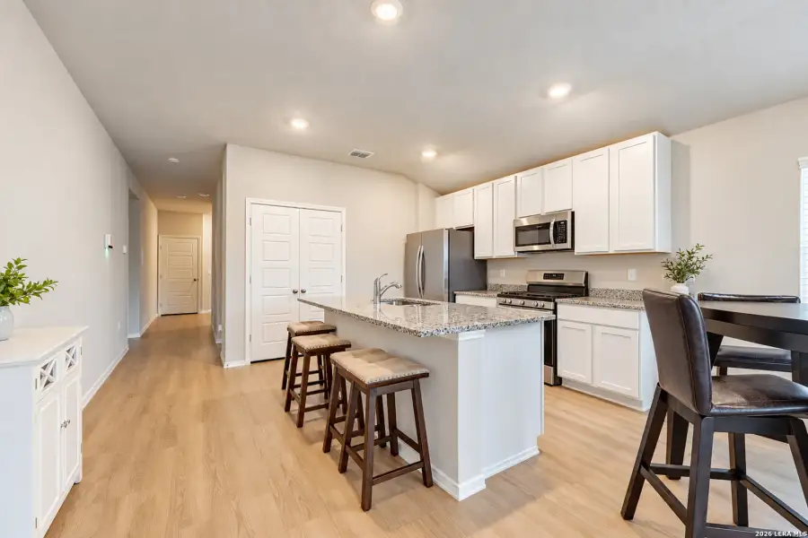 Furnished interior view inside a new home in , San Antonio (Image 11).