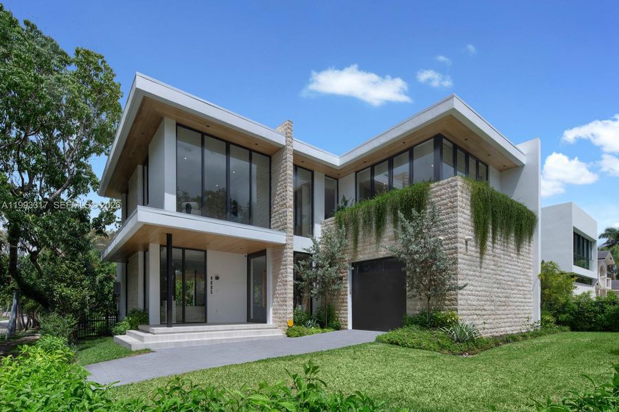 Front exterior of a new home in , Miami, FL, highlighting curb appeal (Image 2).