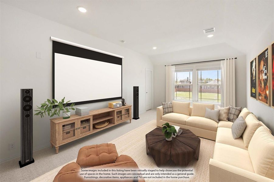 Media room with large projection screen, sectional sofa, tower speakers, and wood media console