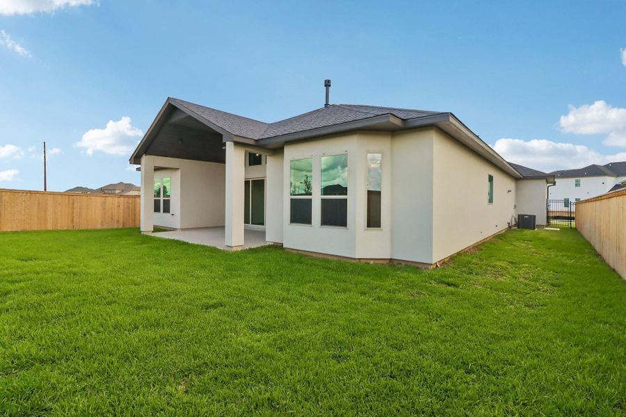 Exterior details and patio area of a home in The Grand Prairie 60', Hockley (Image 25).