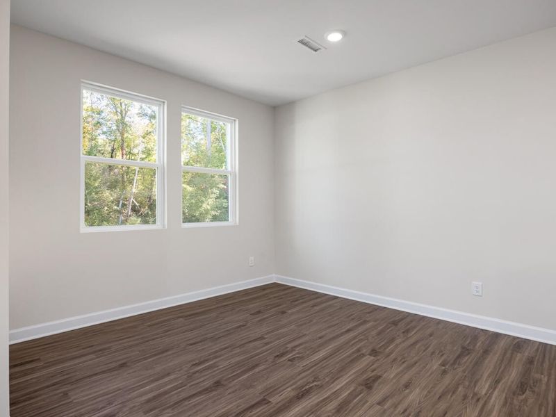 Spacious, unfurnished interior of a new home in Retreat at North Main, Lillington (Image 13).