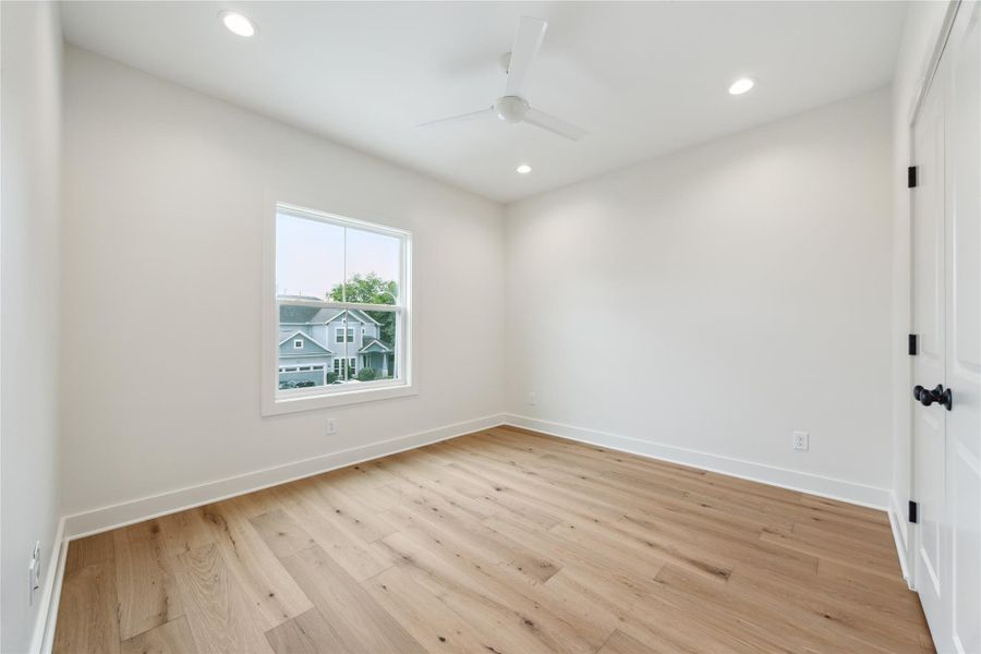 SECONDARY BEDROOM - Previous work by the builder, not representation of current build.