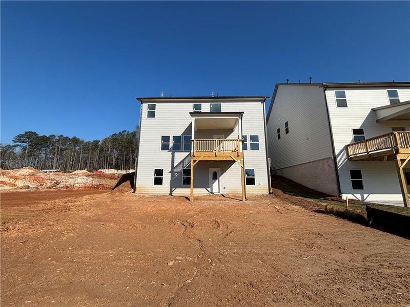 Exterior details and patio area of a home in Arbors at Richland Creek, Buford (Image 6).
