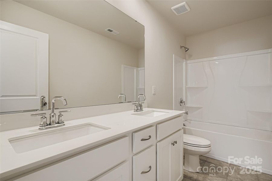 Furnished interior view inside a new home in Shannon Woods: Walk & Enclave, Maiden (Image 4).