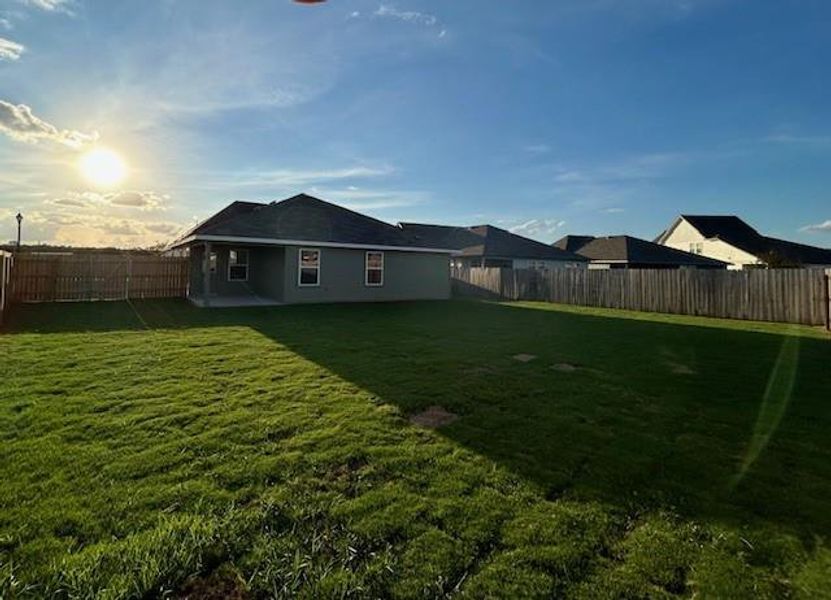 Exterior details and patio area of a home in Cornerstone, Rockdale (Image 3).