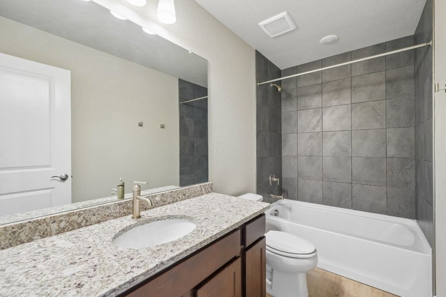 Furnished interior view inside a new home in The Trails at Aspen Ridge, Colorado Springs (Image 17).