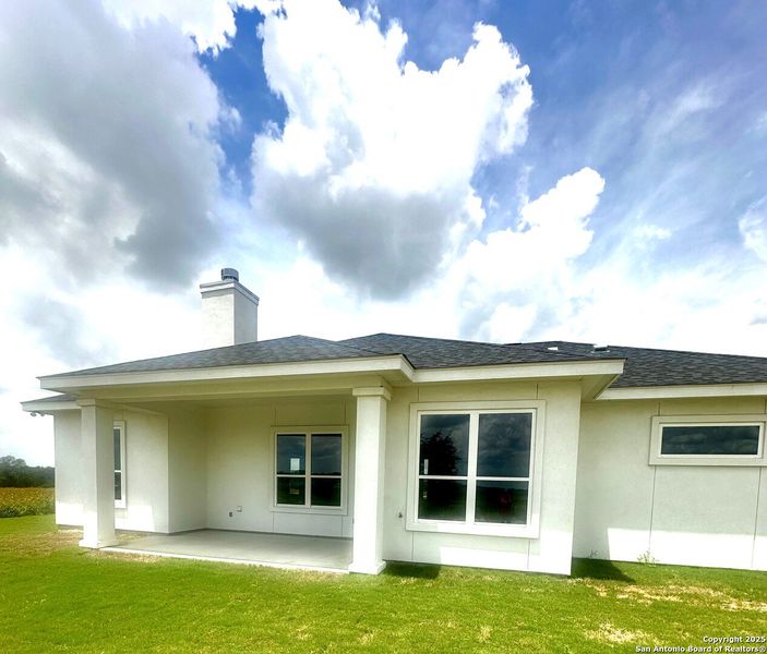Front exterior of a new home in , La Vernia, TX, highlighting curb appeal (Image 25). Front exterior of a new home in , La Vernia, TX, highlighting curb appeal (Image 25).