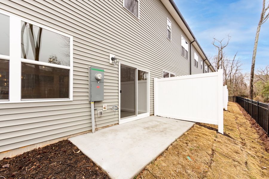 Exterior details and patio area of a home in Fifteen 15 Cannon, Charlotte (Image 21).