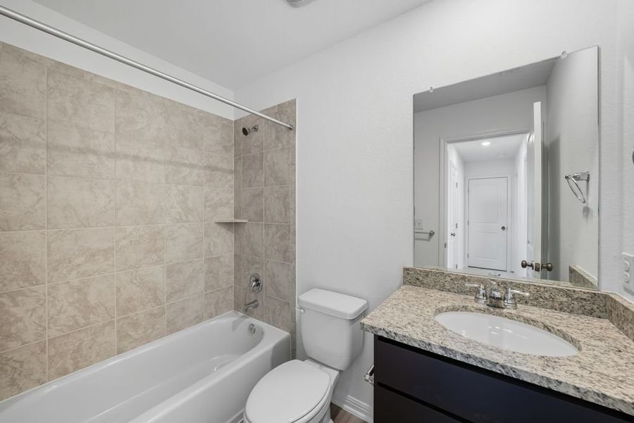 Furnished interior view inside a new home in Longview 40s, Del Valle (Image 7).