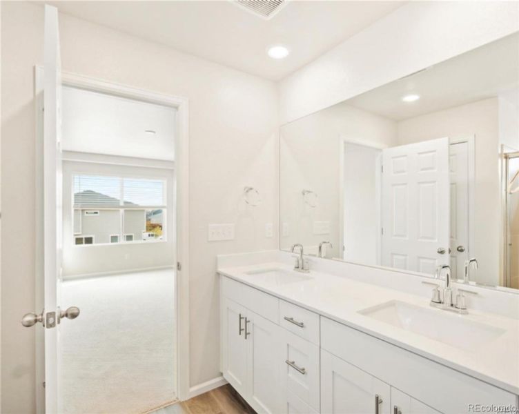Furnished interior view inside a new home in Buffalo Highlands: The Flora Collection, Commerce City (Image 6).