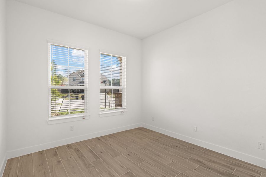 Spacious, unfurnished interior of a new home in The Highlands, Porter (Image 30).