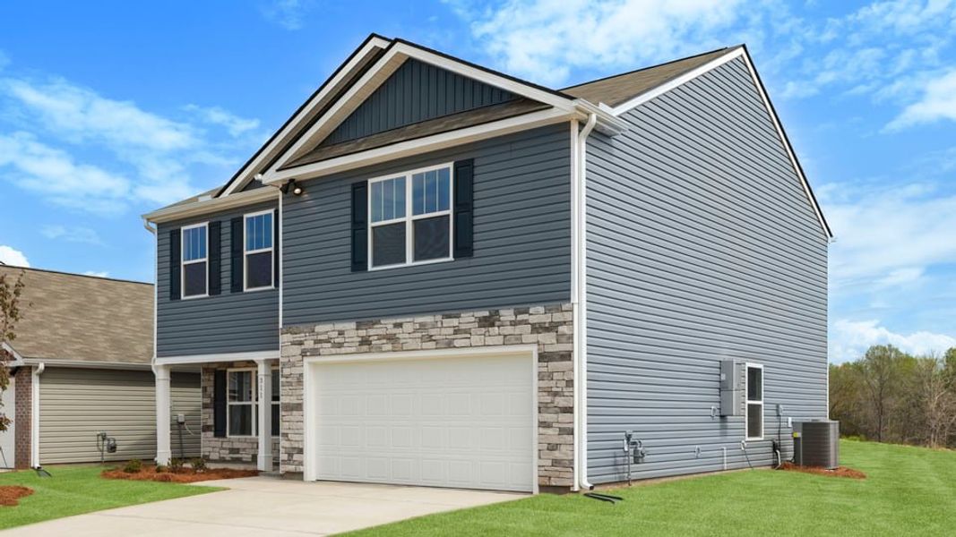 Front exterior of a new home in Lakestone, Woodruff, SC, highlighting curb appeal (Image 19).