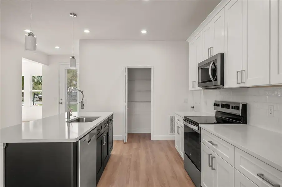 Furnished interior view inside a new home in , Osteen (Image 10).