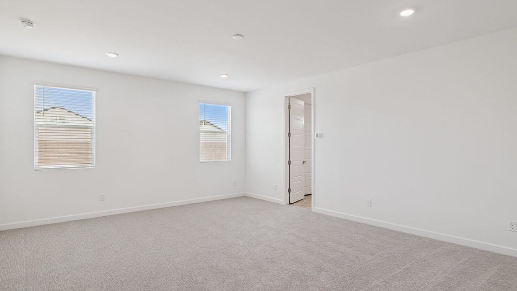 Spacious, unfurnished interior of a new home in Zanjero Pass, Waddell (Image 33).