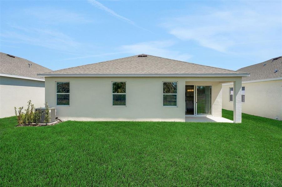 Exterior details and patio area of a home in Willowbrook North, Winter Haven (Image 14). Exterior details and patio area of a home in Willowbrook North, Winter Haven (Image 14).